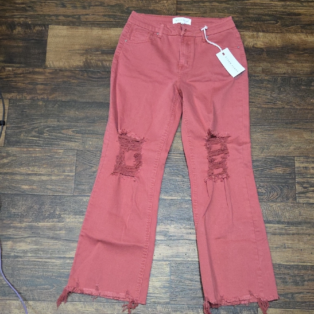 Frayed Hem Flare Jeans in Rose by [Brand]